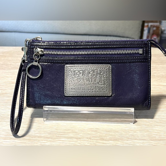 Coach Handbags - Coach Poppy Deep Purple Wristlet EUC